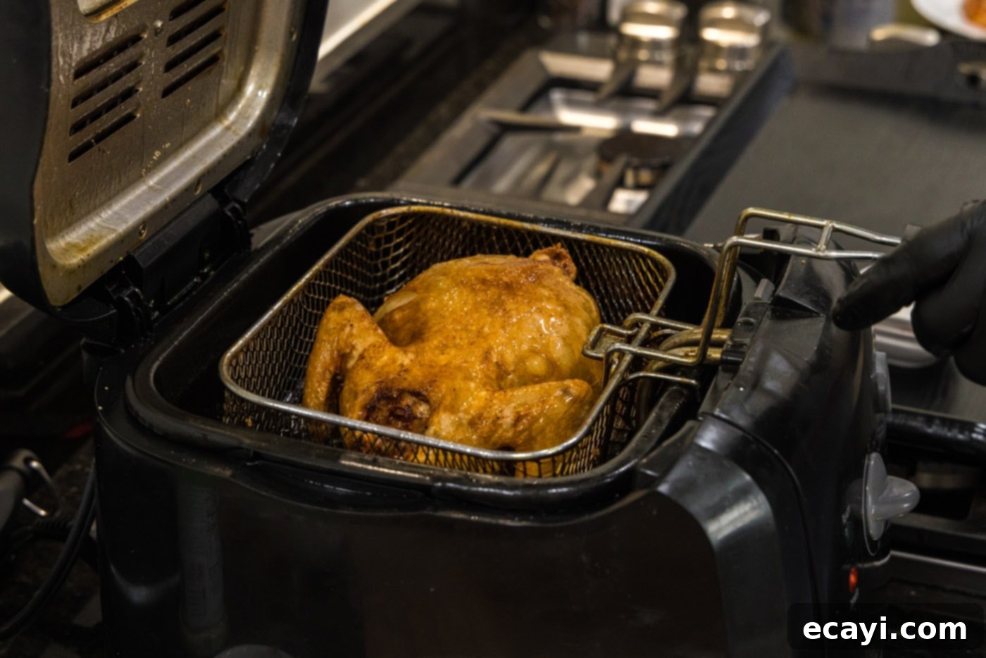 Crispy Golden Cornish Hens 12 deep fried cornish hen in a basket, showcasing golden brown color