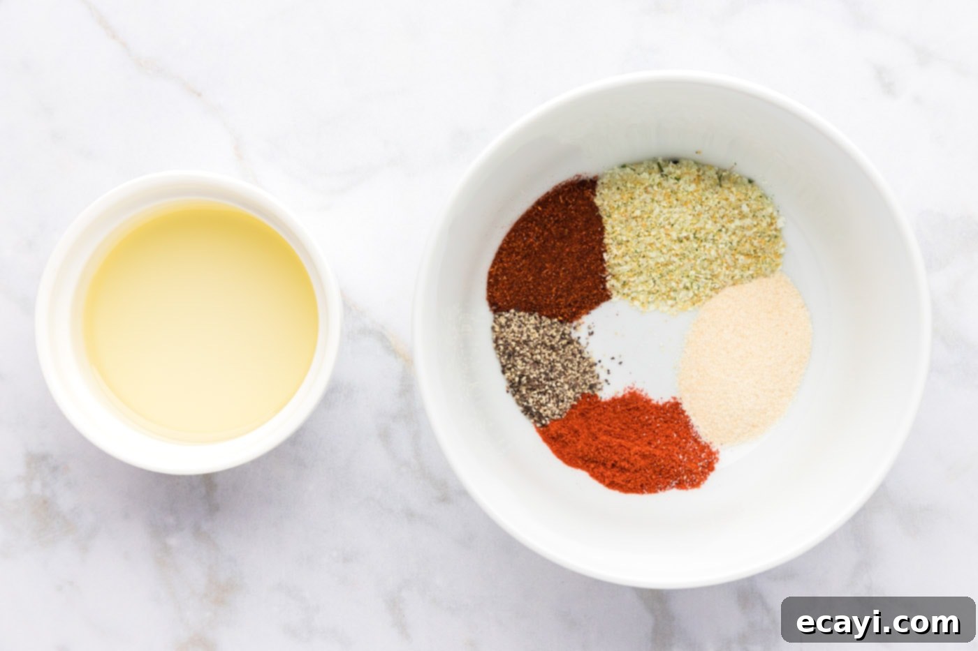 Crispy Golden Cornish Hens 5 wet rub ingredients in bowls ready for mixing