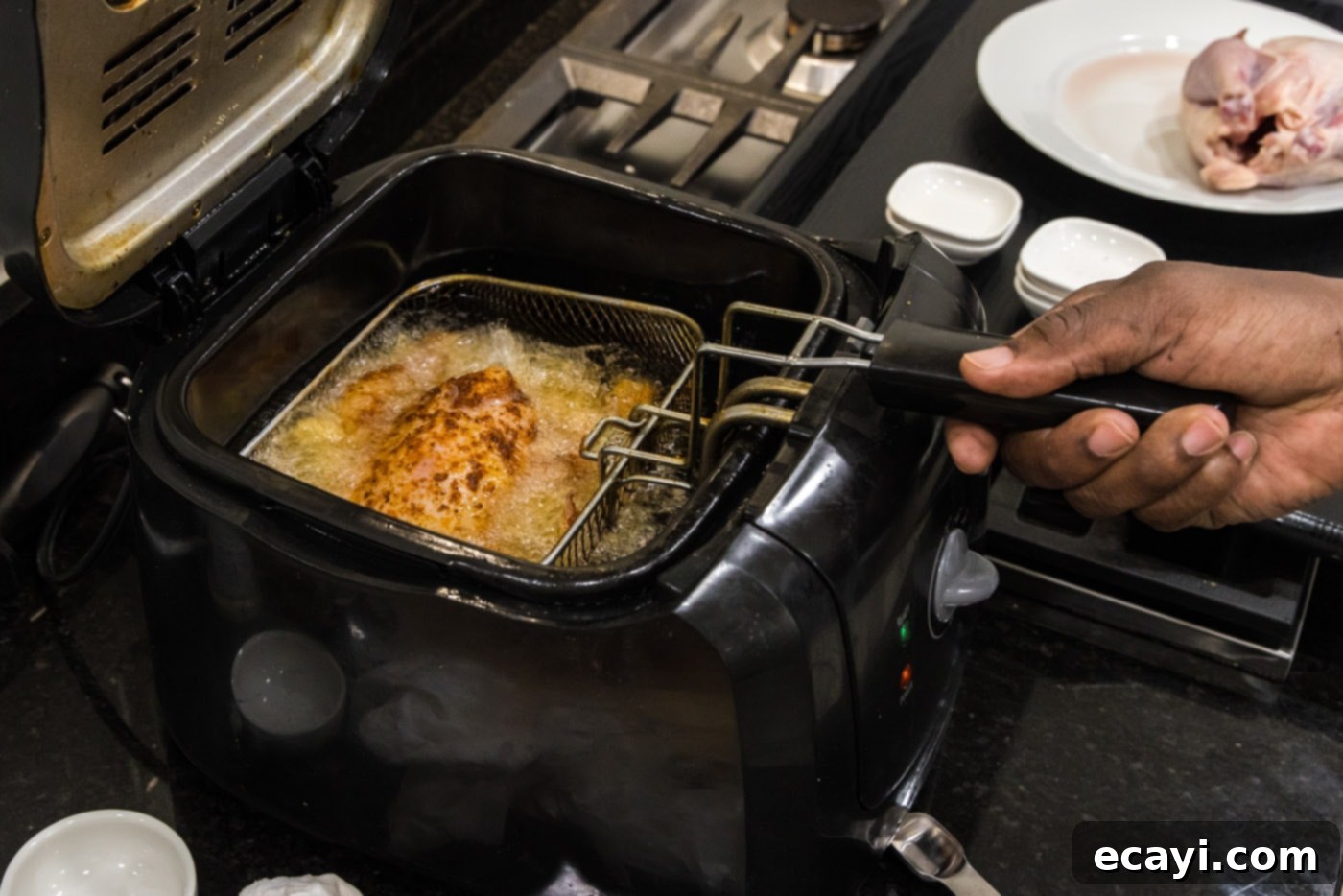 Crispy Golden Cornish Hens 10 deep frying cornish hen in hot oil for perfect crispiness