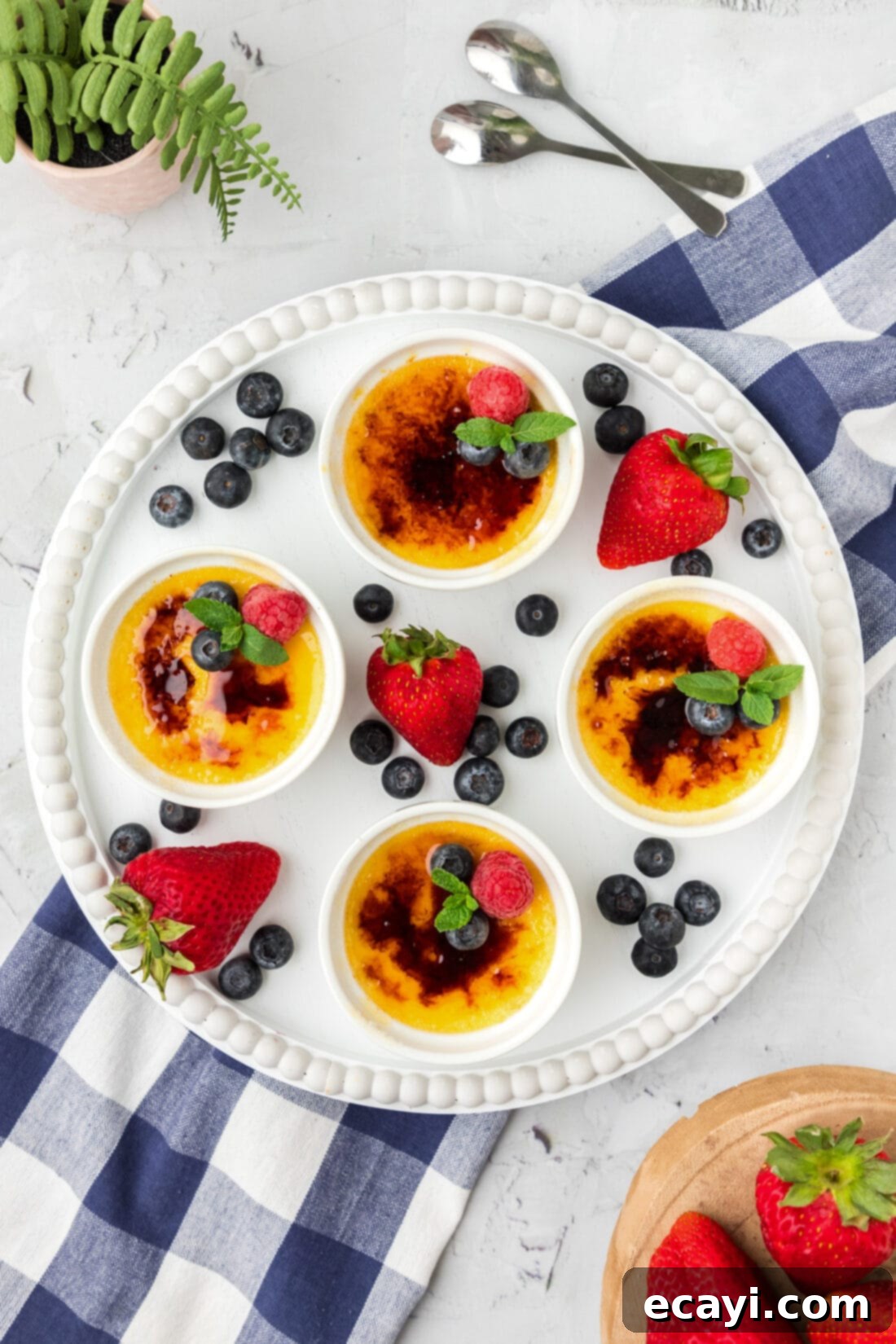 Creme Brulee 2 Creme Brulee on a platter with assorted fruit