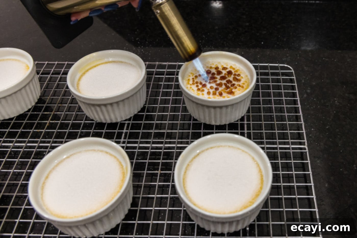 Creme Brulee 20 torching sugar over custard filing