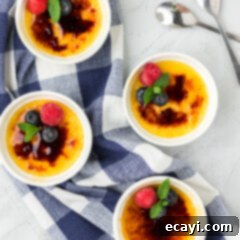 Creme Brulee 23 Four ramekins of Creme Brulee topped with fruit
