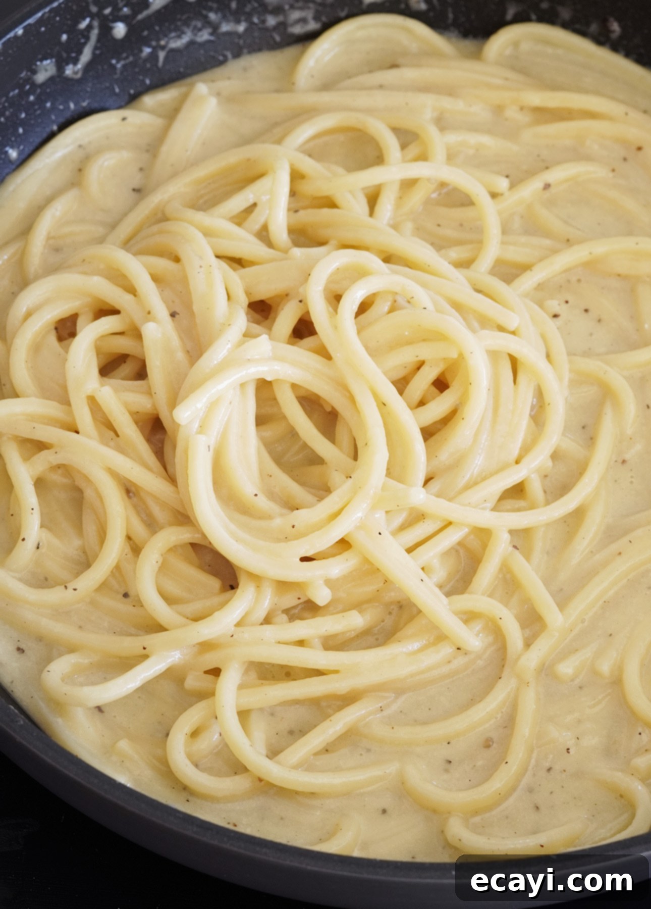The Secret to Perfect Cacio e Pepe 11 Perfectly creamy and smooth Cacio e Pepe pasta, a true Italian delight