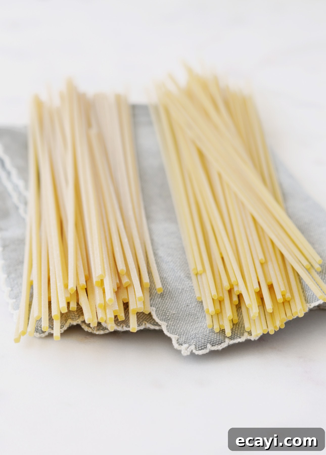 The Secret to Perfect Cacio e Pepe 8 Spaghetti alla Chitarra (Tonnarelli), the traditional Cacio e Pepe pasta, compared to regular spaghetti