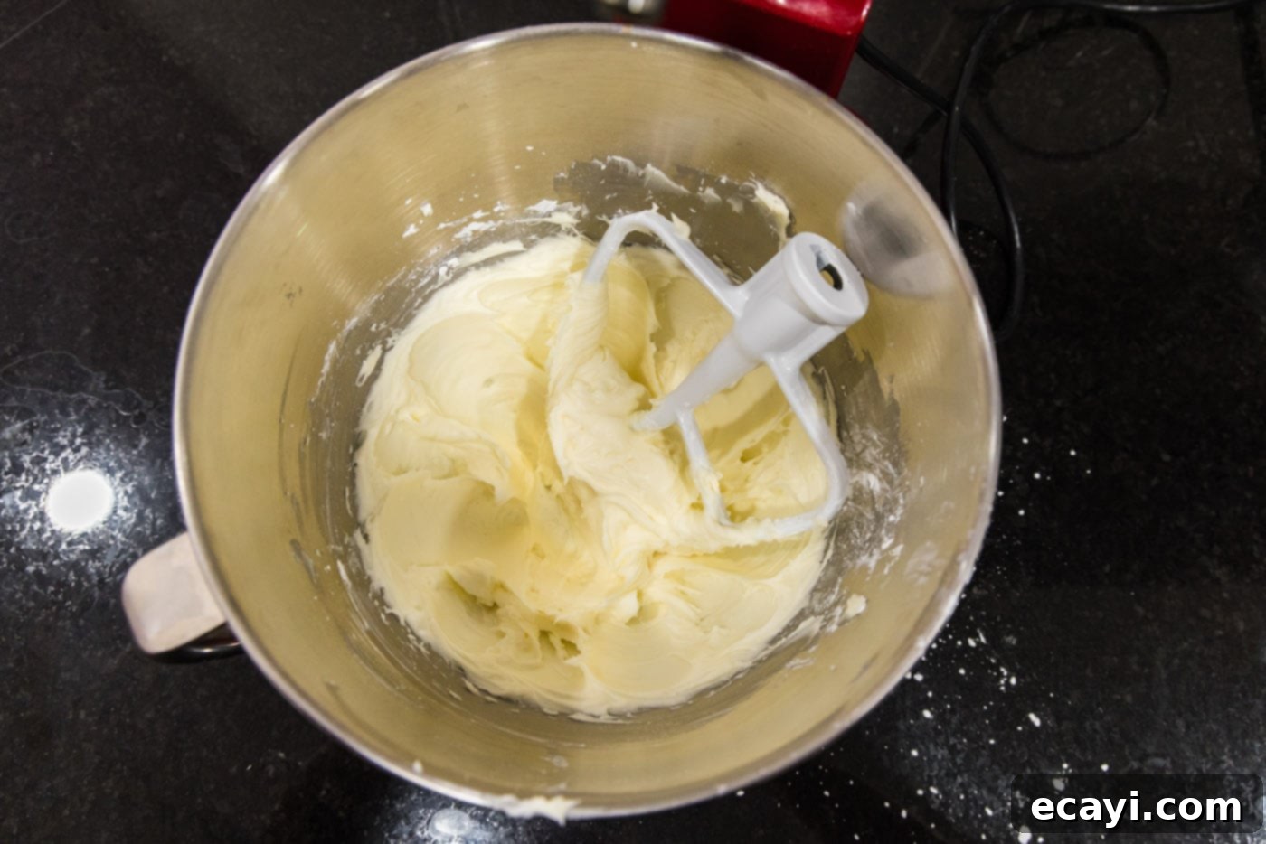 Peanut Butter Bliss 8 whipped sugar, cream cheese, and butter in a bowl