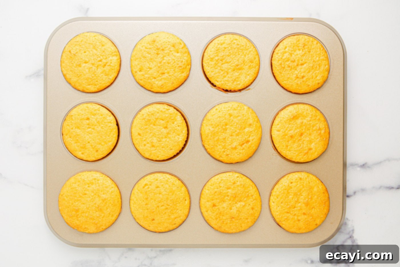 Ghoul-icious Cupcakes 7 A tray of freshly baked vanilla cupcakes