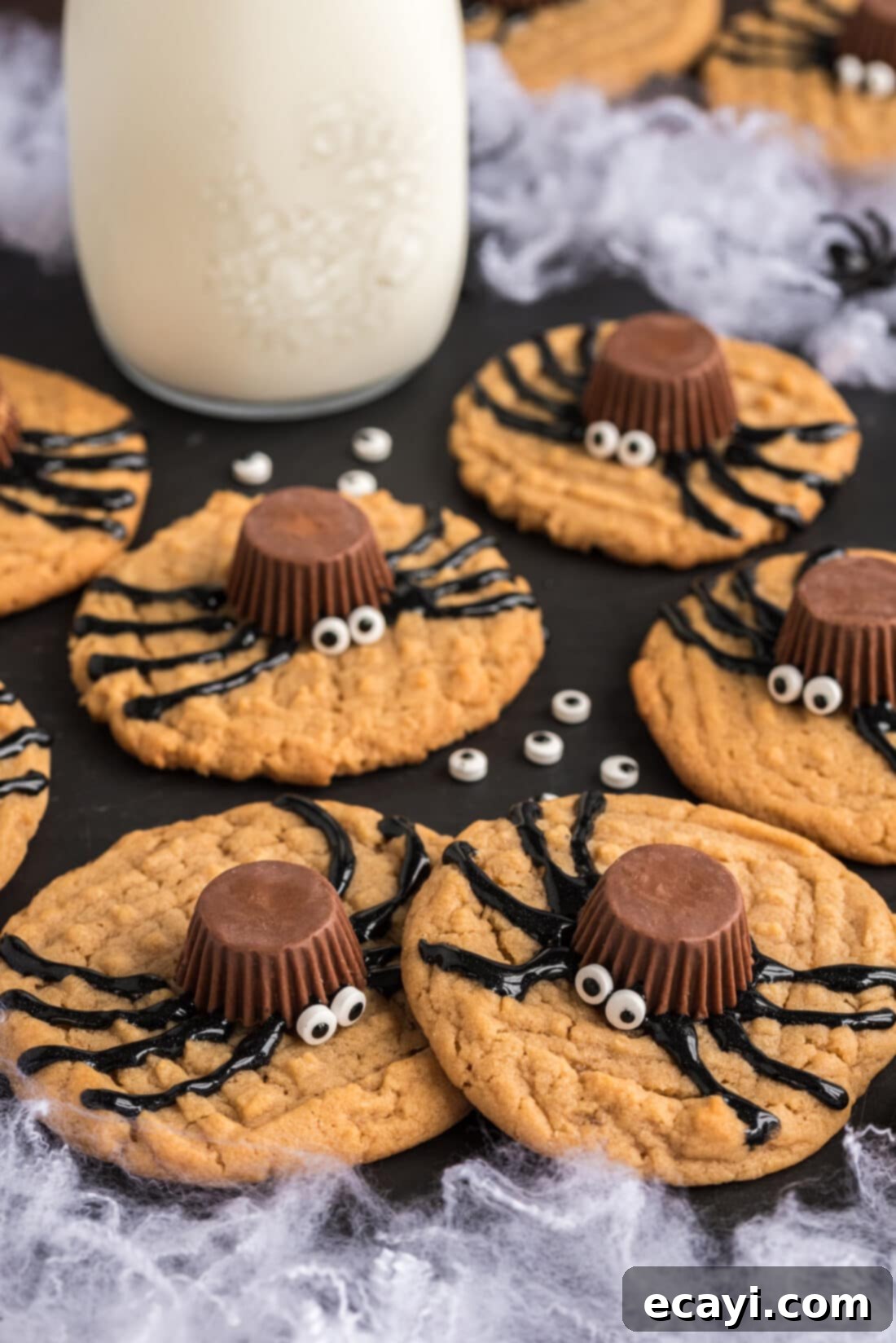 Spooky Spider Cookies 2 Spider Cookies on a platter with a jar of milk in the background