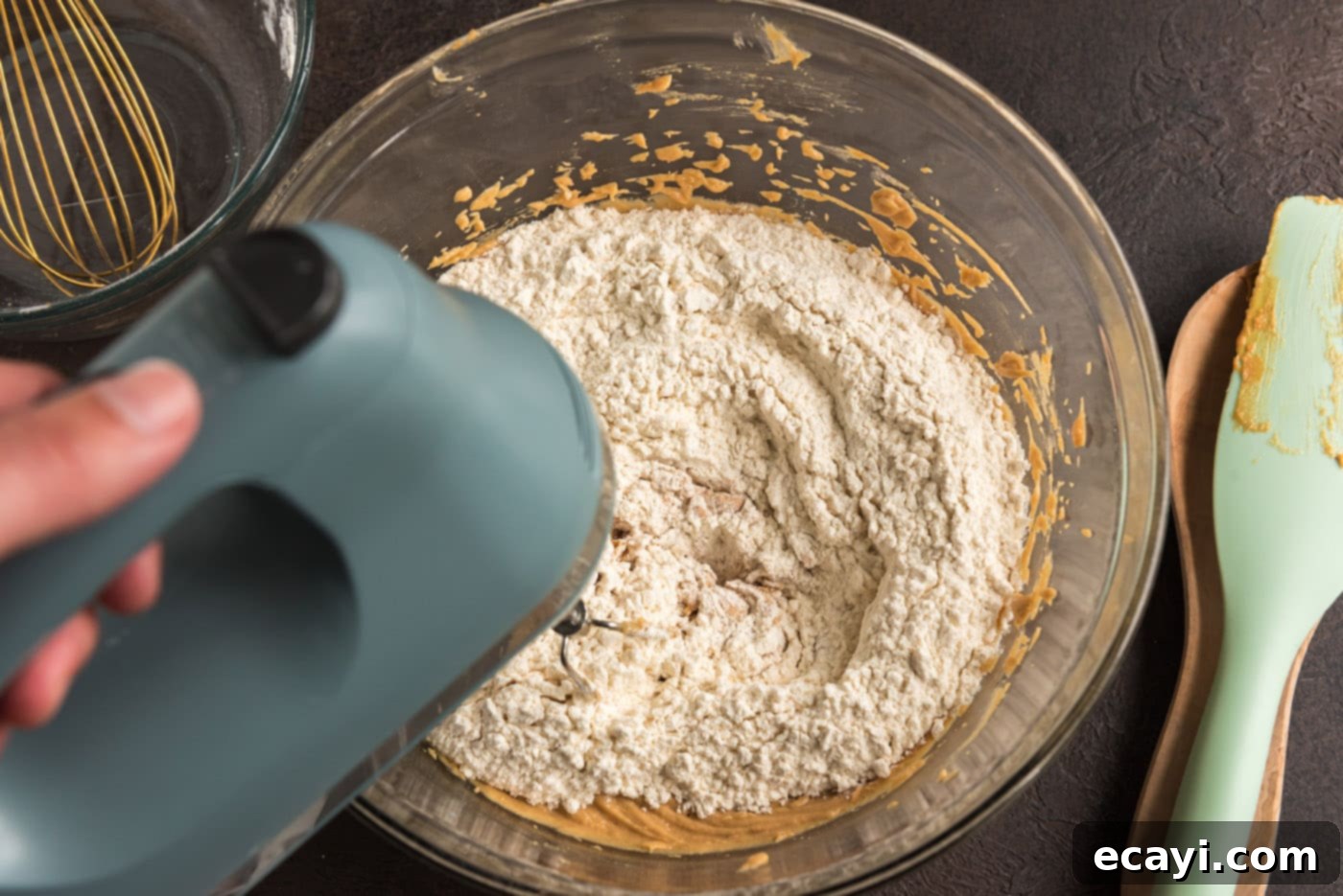 Spooky Spider Cookies 8 adding dry ingredients to wet ingredients for cookie dough