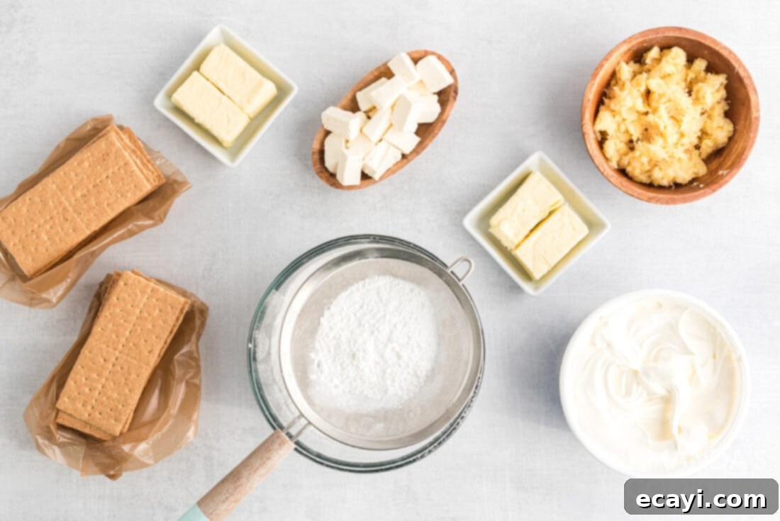Pineapple Cloud Delight 4 All the essential ingredients laid out for preparing the Pineapple Dream Dessert, including graham crackers, butter, cream cheese, Cool Whip, powdered sugar, and canned crushed pineapple.