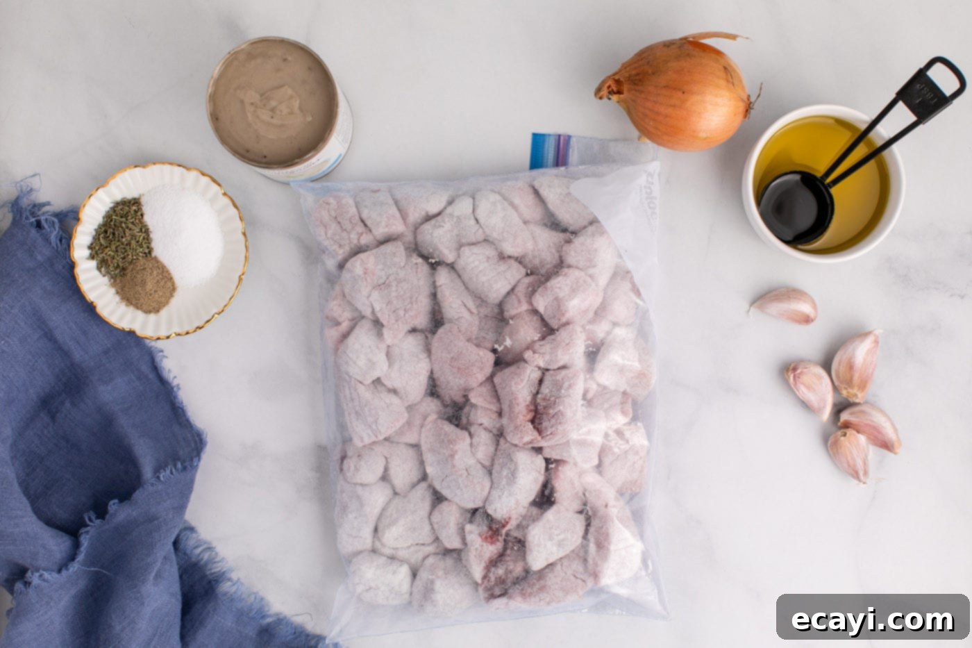 Homestyle Beef Noodles 5 beef stew meat chunks in a bag with flour, showing thorough coating