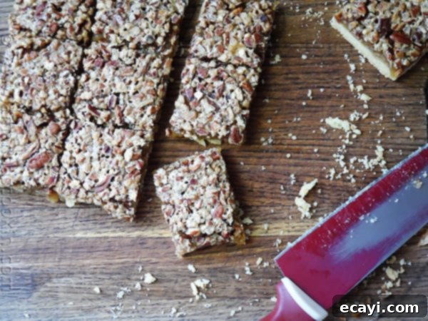 Pecan Perfection Bars 3 Pecan Pie Bars - AmandasCookin.com @amandaformaro
