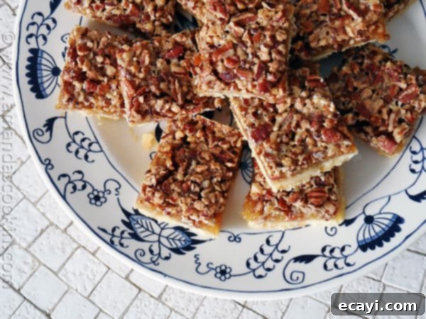 Pecan Perfection Bars 4 Pecan Pie Bars - AmandasCookin.com @amandaformaro