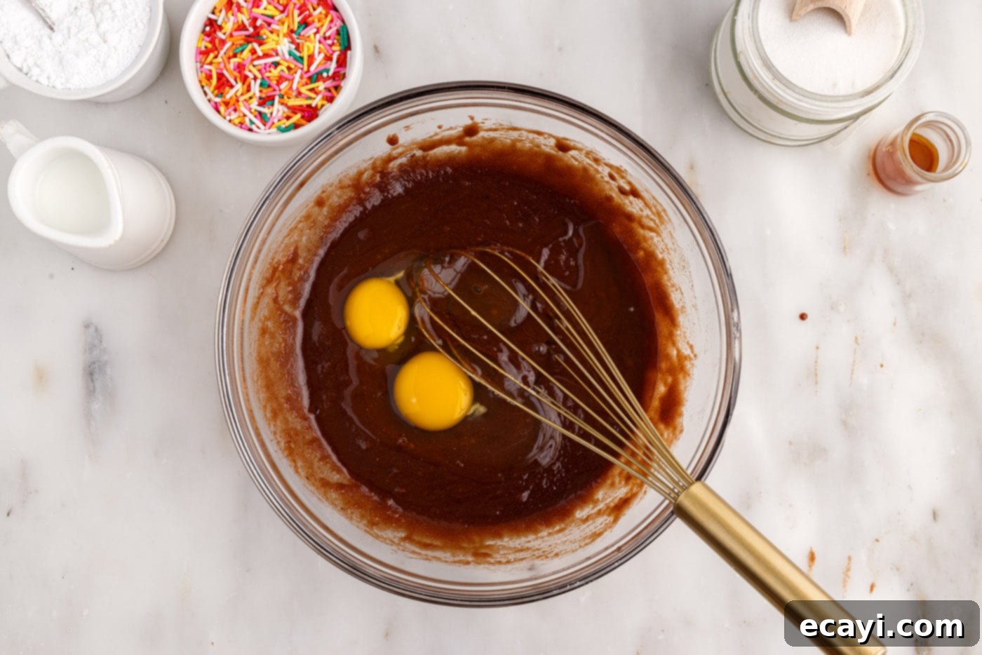 ChocoRings 7 gently whisking eggs into the chocolate and sugar mixture