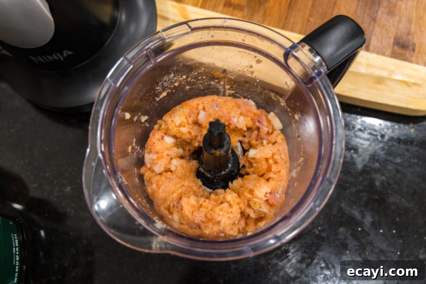 Delicious Salmon Burgers 6 Blitzed salmon mixture with spices and onion in a food processor