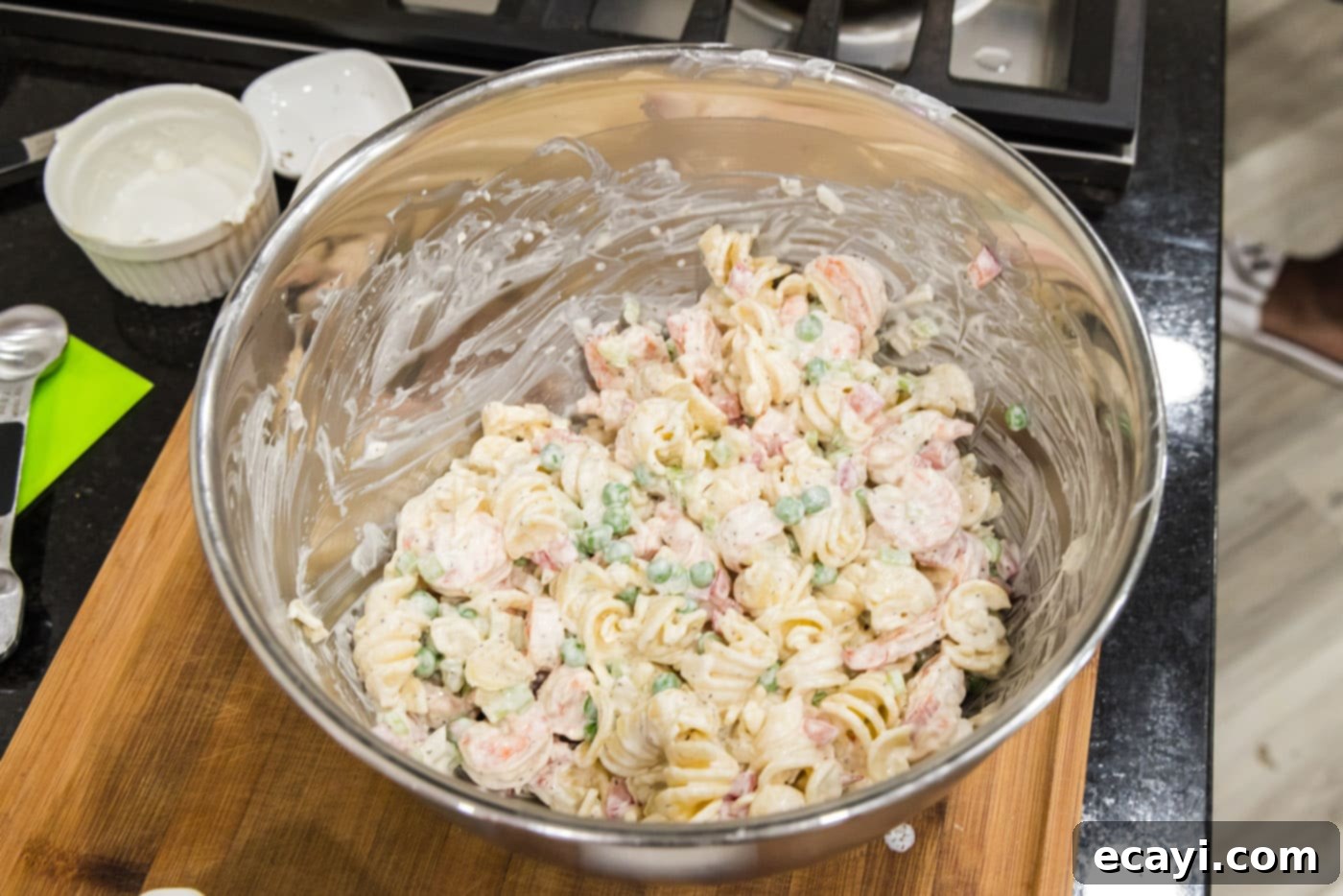 Lemon-Herb Shrimp Pasta Salad 10 A close-up view of the perfectly mixed creamy shrimp pasta salad in a bowl, ready to be chilled.