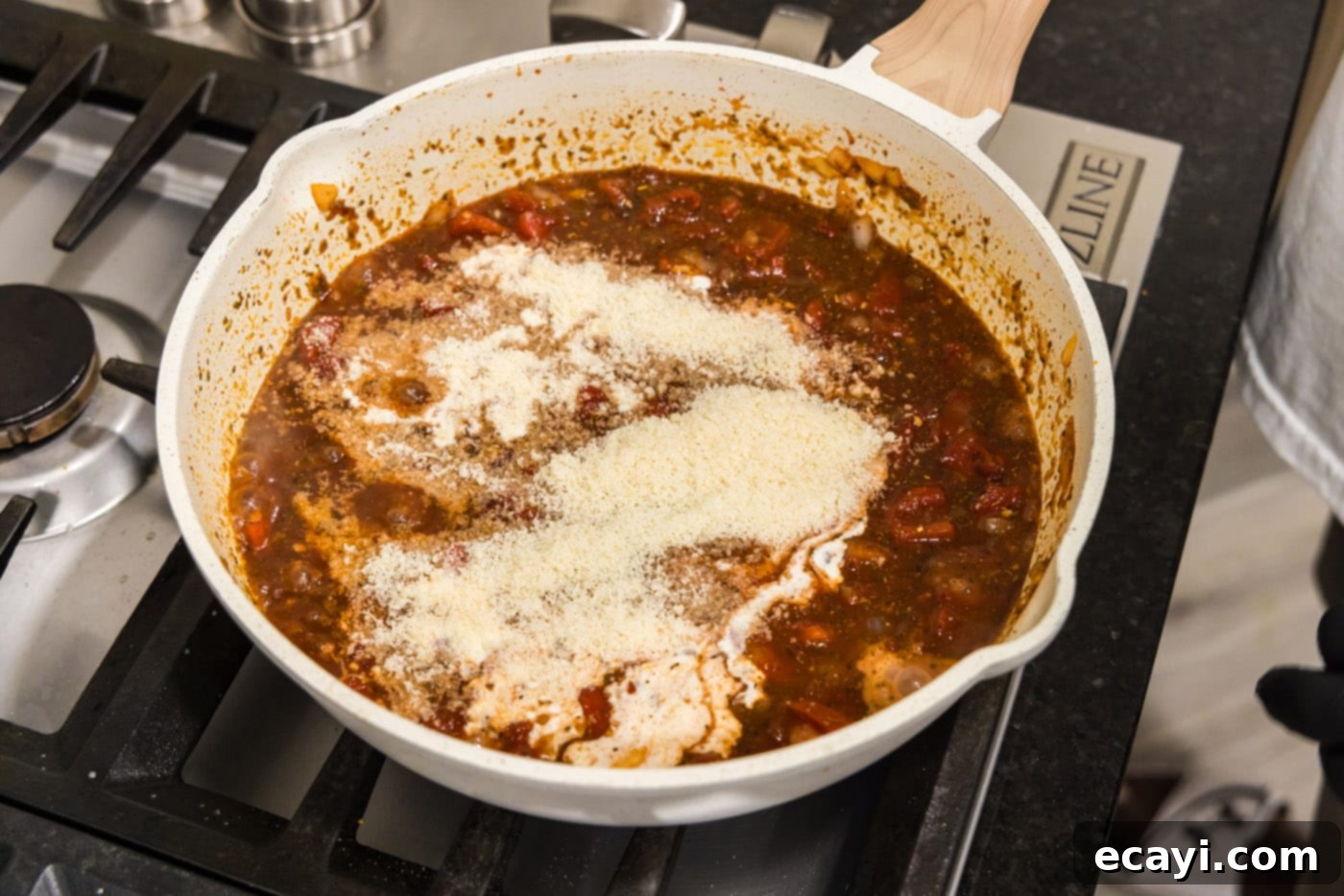 Creamy Vodka Pasta Sauce 11 creamy vodka tomato sauce simmering in a skillet, showcasing its rich texture