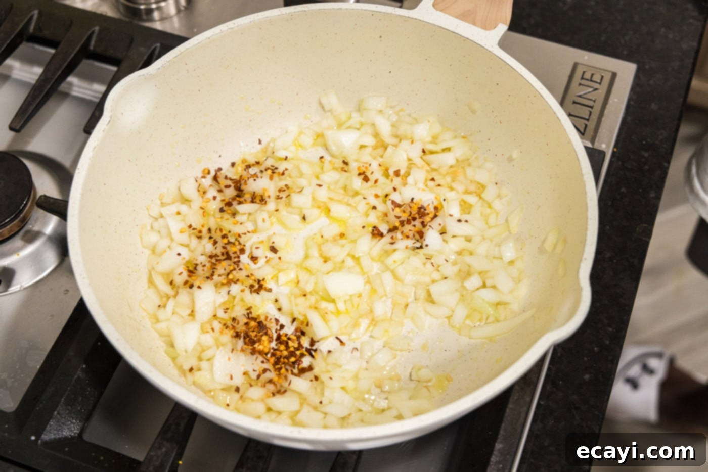 Creamy Vodka Pasta Sauce 5 garlic, onion, and red pepper flakes sizzling in a skillet of olive oil