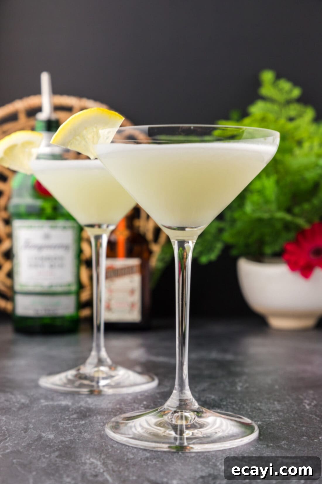 Moonlit Whisper 2 Two White Lady Cocktails garnished with a lemon wedge