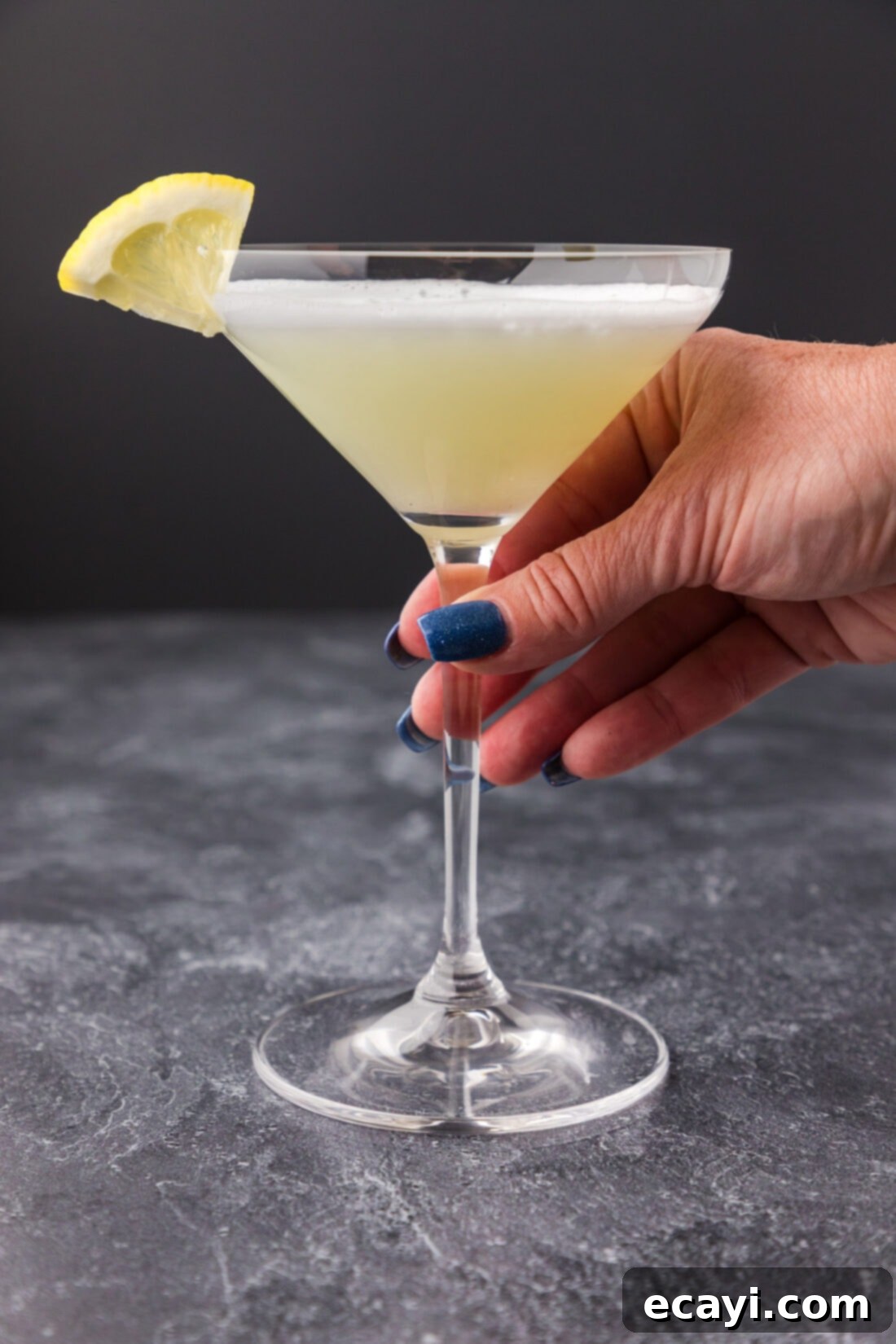 Moonlit Whisper 3 Hand holding a White Lady Cocktail