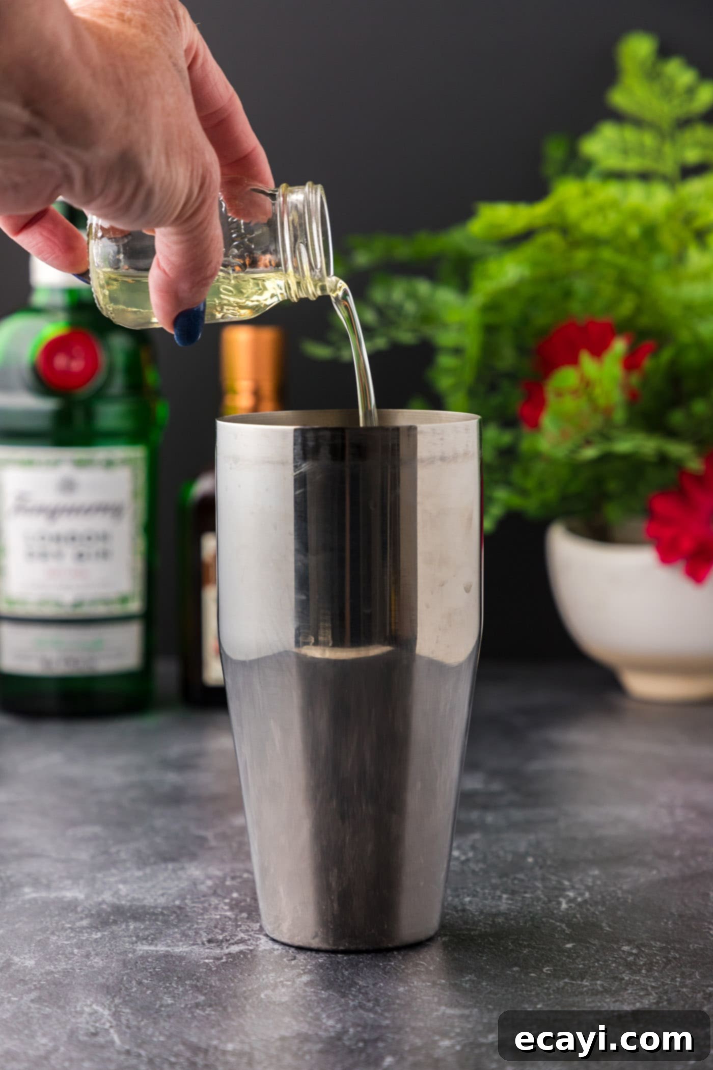 Moonlit Whisper 5 pouring egg whites into cocktail shaker