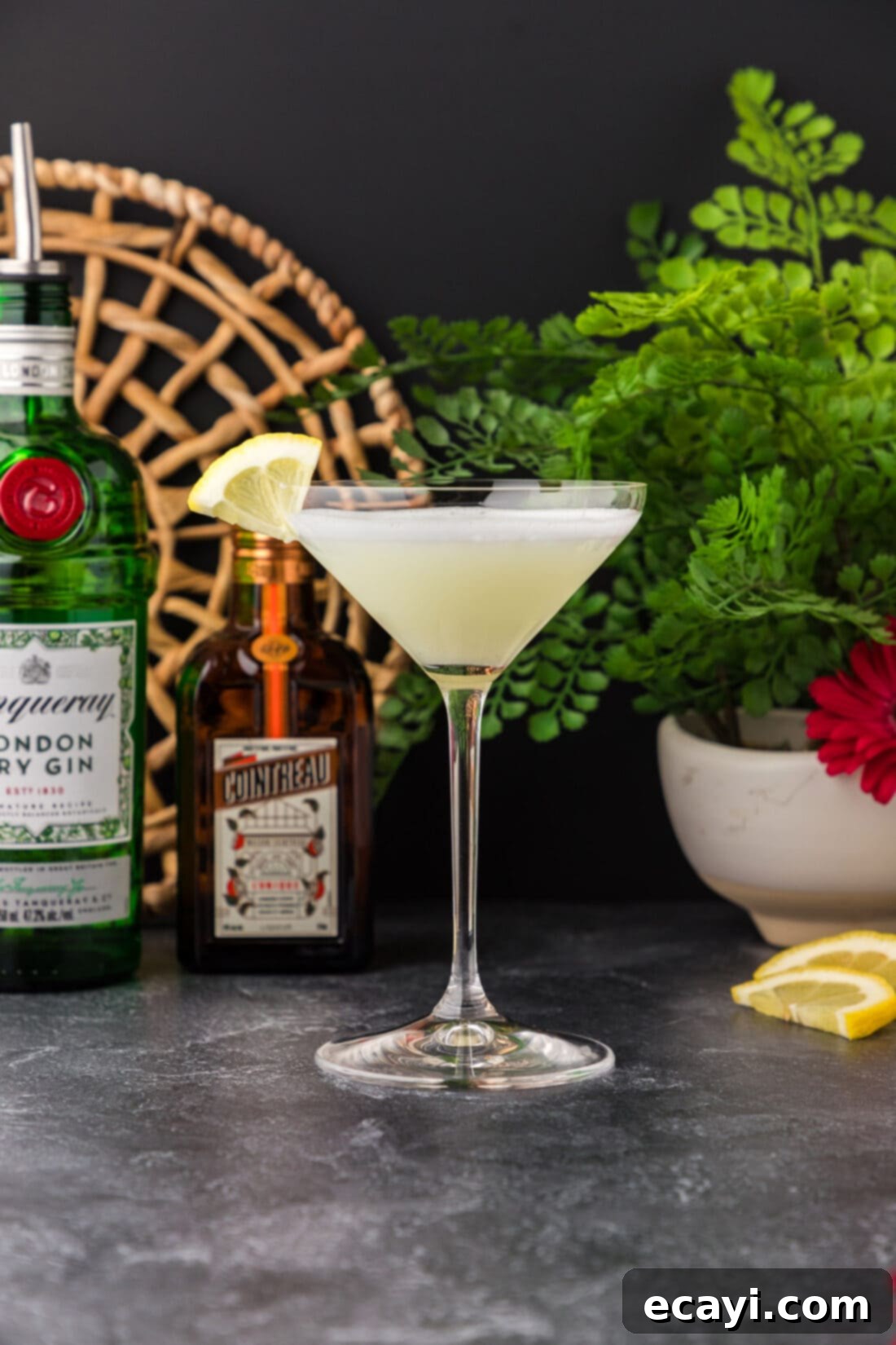 Moonlit Whisper 9 White Lady Cocktail with ingredients in the background
