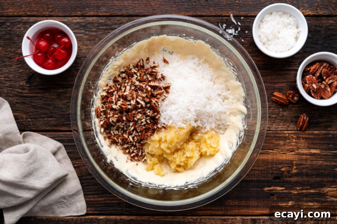 Decadent Dream Pie 6 shredded coconut, crushed pineapple, and pecans added to sweetened condensed milk mixture