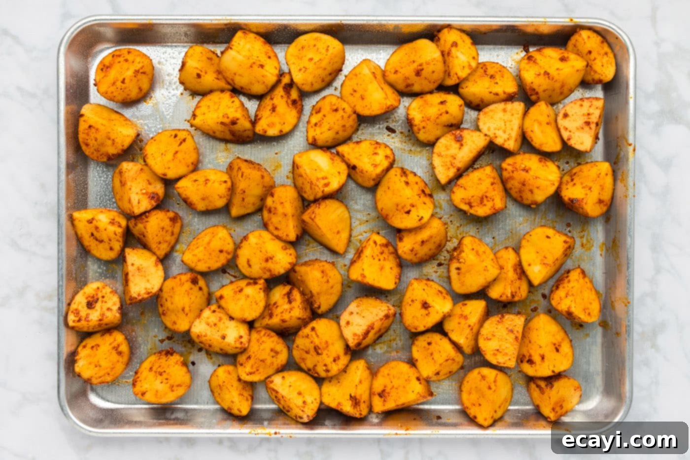Fiery Roasted Potatoes 9 spicy potatoes on a large baking sheet