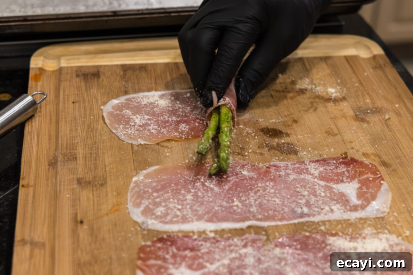 Crispy Prosciutto-Wrapped Asparagus 10 rolling asparagus spears in prosciutto