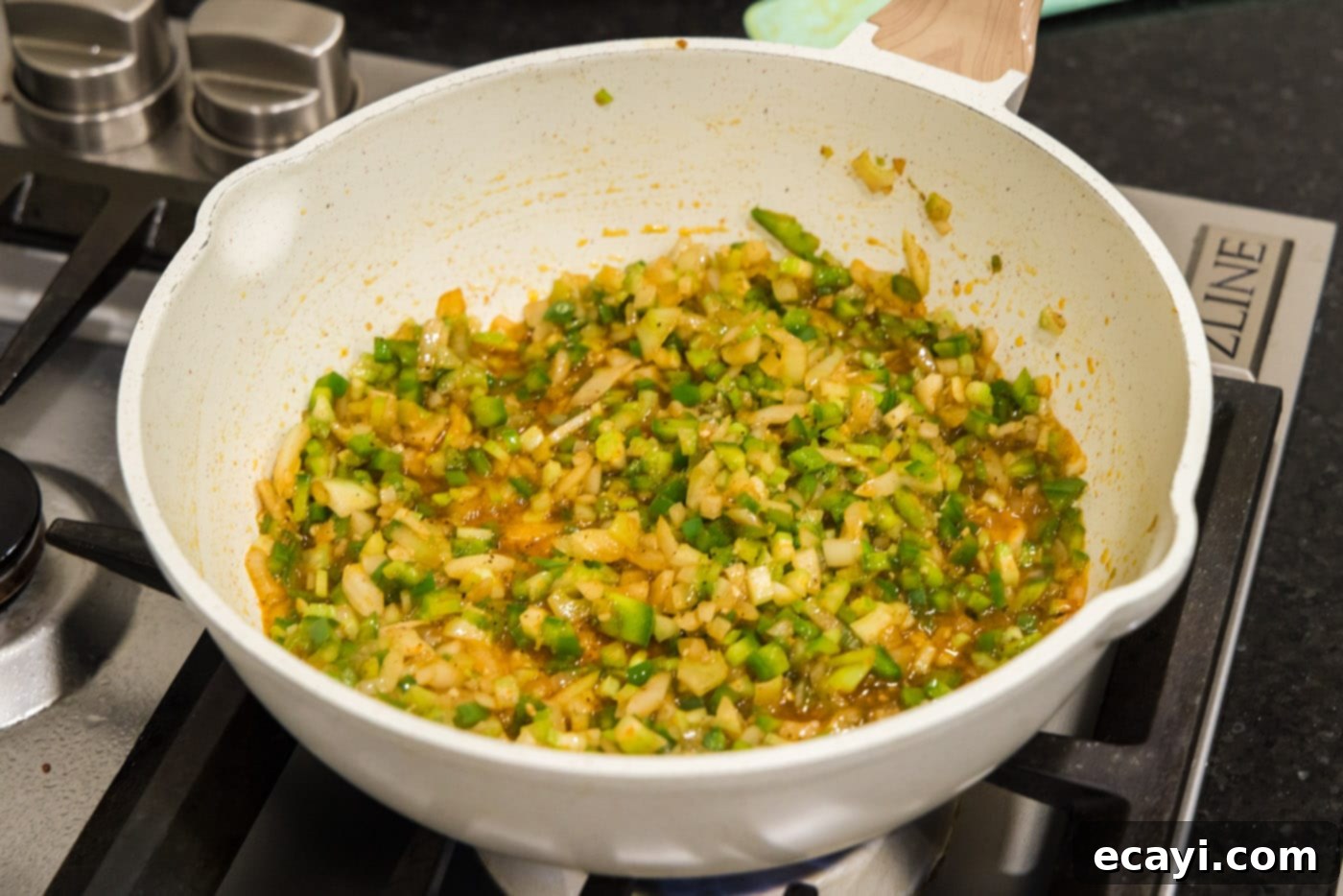 Hearty Louisiana Red Beans and Rice 7 Holy Trinity vegetables and seasoning sautéing in a skillet