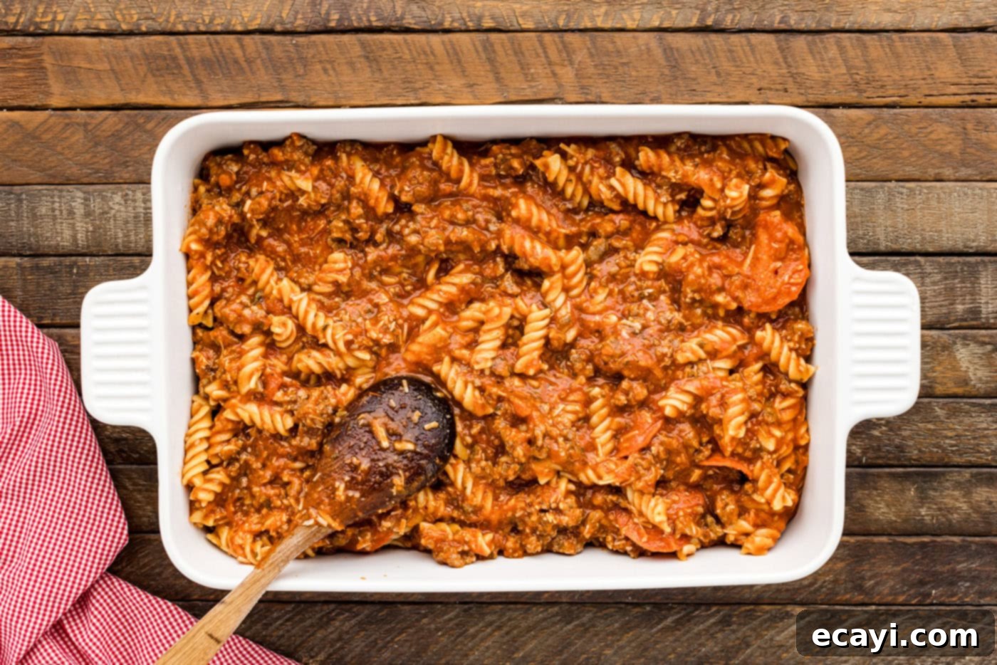 Ultimate Sausage and Pepperoni Pizza Bake 8 pizza casserole in a baking dish