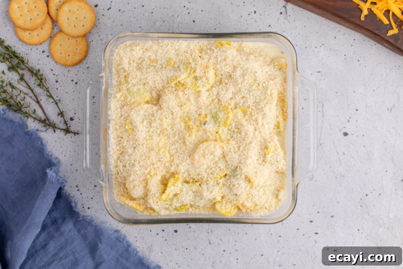 Golden Squash Bake 11 parmesan cheese on top of squash casserole