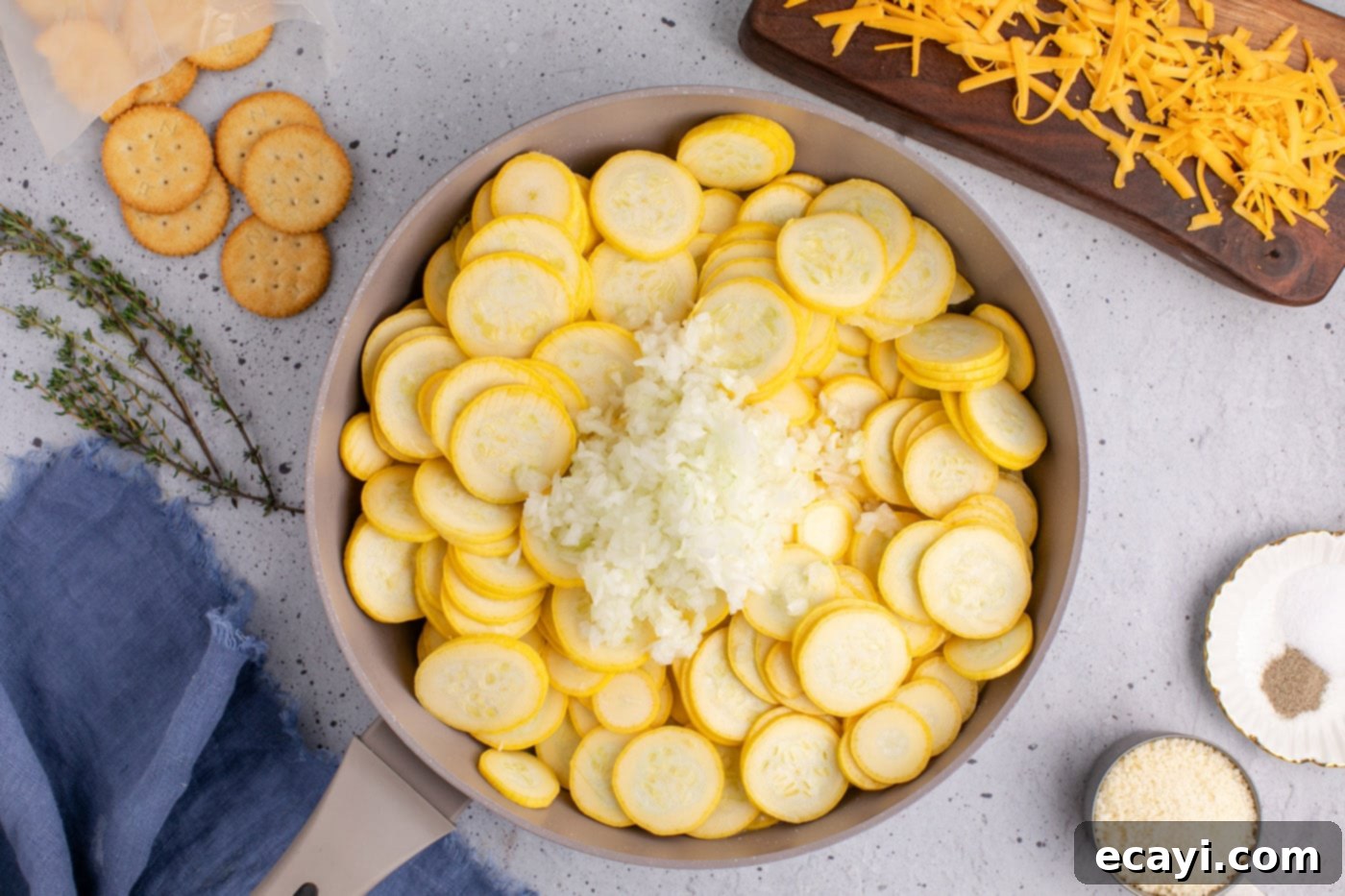 Golden Squash Bake 5 squash slices with chopped onion in a skillet