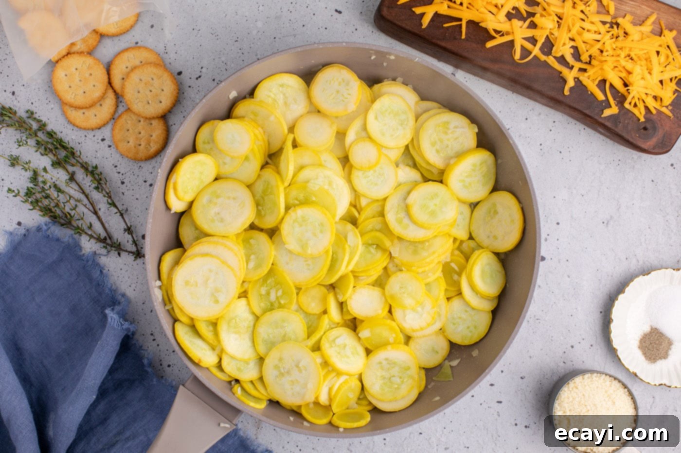 Golden Squash Bake 6 partially cooked squash slices and onion in a skillet