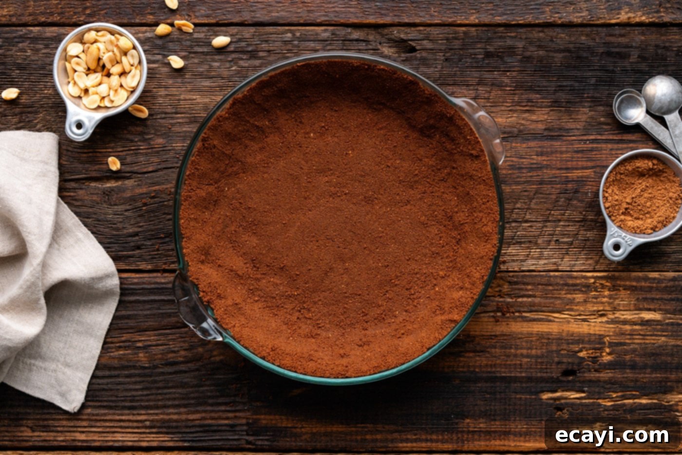 Decadent Peanut Butter Chocolate Dream 7 chocolate graham cracker pie crust in a pie plate