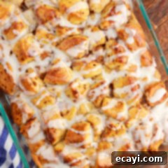 Gooey Cinnamon Brunch Bake 13 Overhead photo of Cinnamon Roll Casserole, showcasing the gooey icing