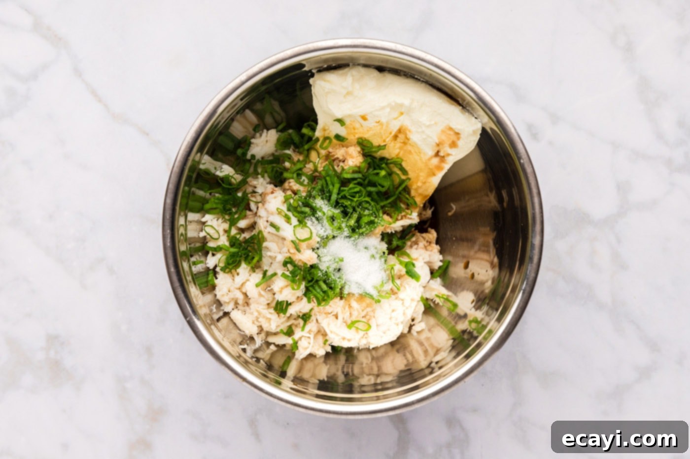 Golden Crab Cream Crisps 5 crab rangoon filling ingredients in a mixing bowl