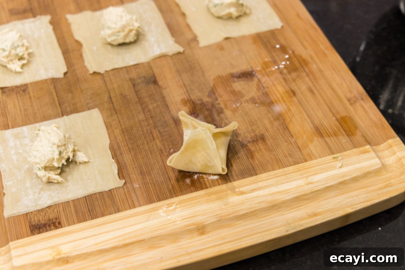 Golden Crab Cream Crisps 10 how to fold a crab rangoon