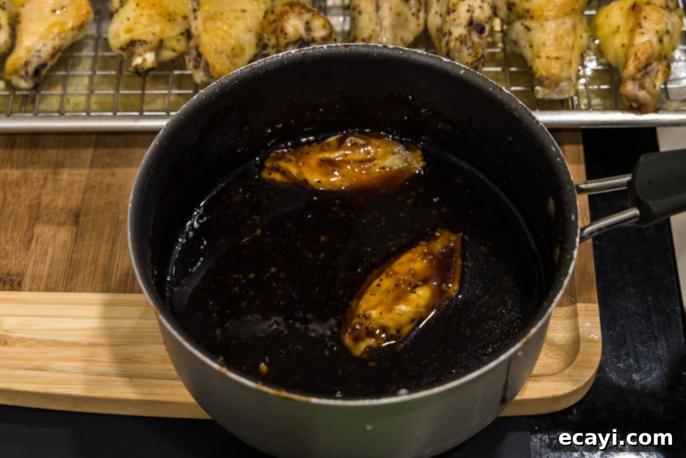 Sticky Honey Garlic Wings 10 coating wings in honey garlic sauce