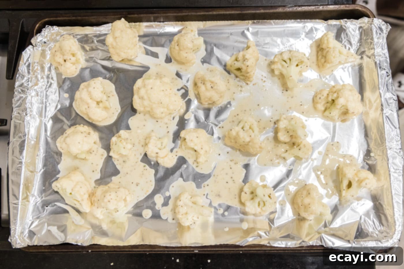 Buffalo Cauliflower Bites 9 cauliflower dredged in flour coating