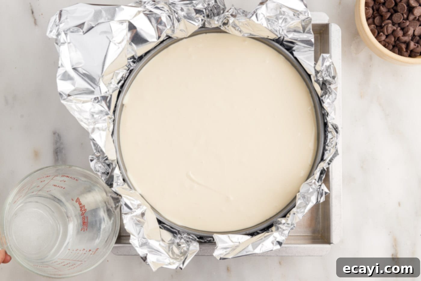 Irresistible Baileys Cheesecake 13 cheesecake wrapped in two layers of foil