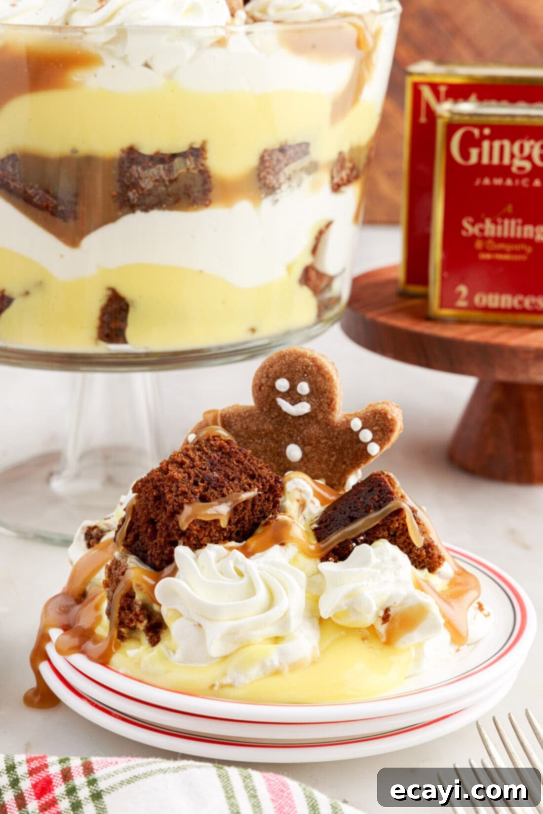 Gingerbread Layered Delight 14 A slice of Gingerbread Trifle served on a white plate, showing the distinct layers