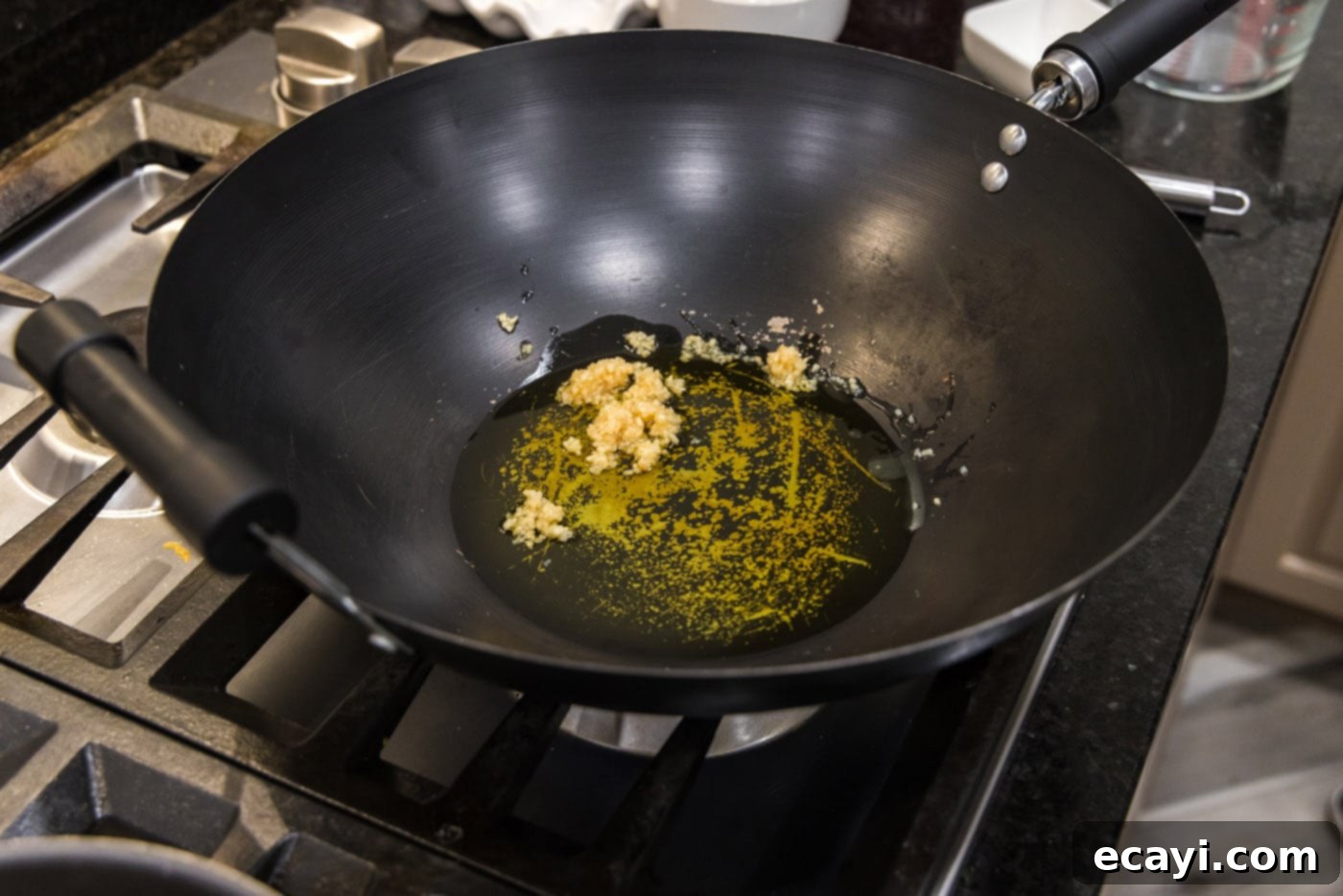 Garlic Shrimp & Broccoli Sauté 8 garlic sizzling in olive oil in a hot wok