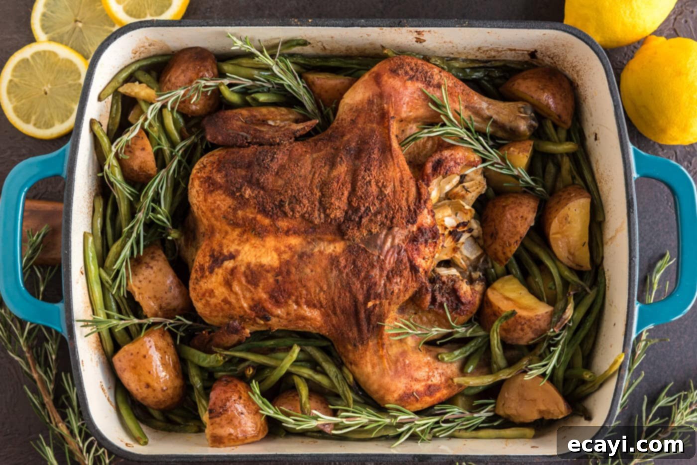 Slow Roasted Caramelized Chicken 11 slow roasted sticky chicken overhead in a pan with green beans and potatoes