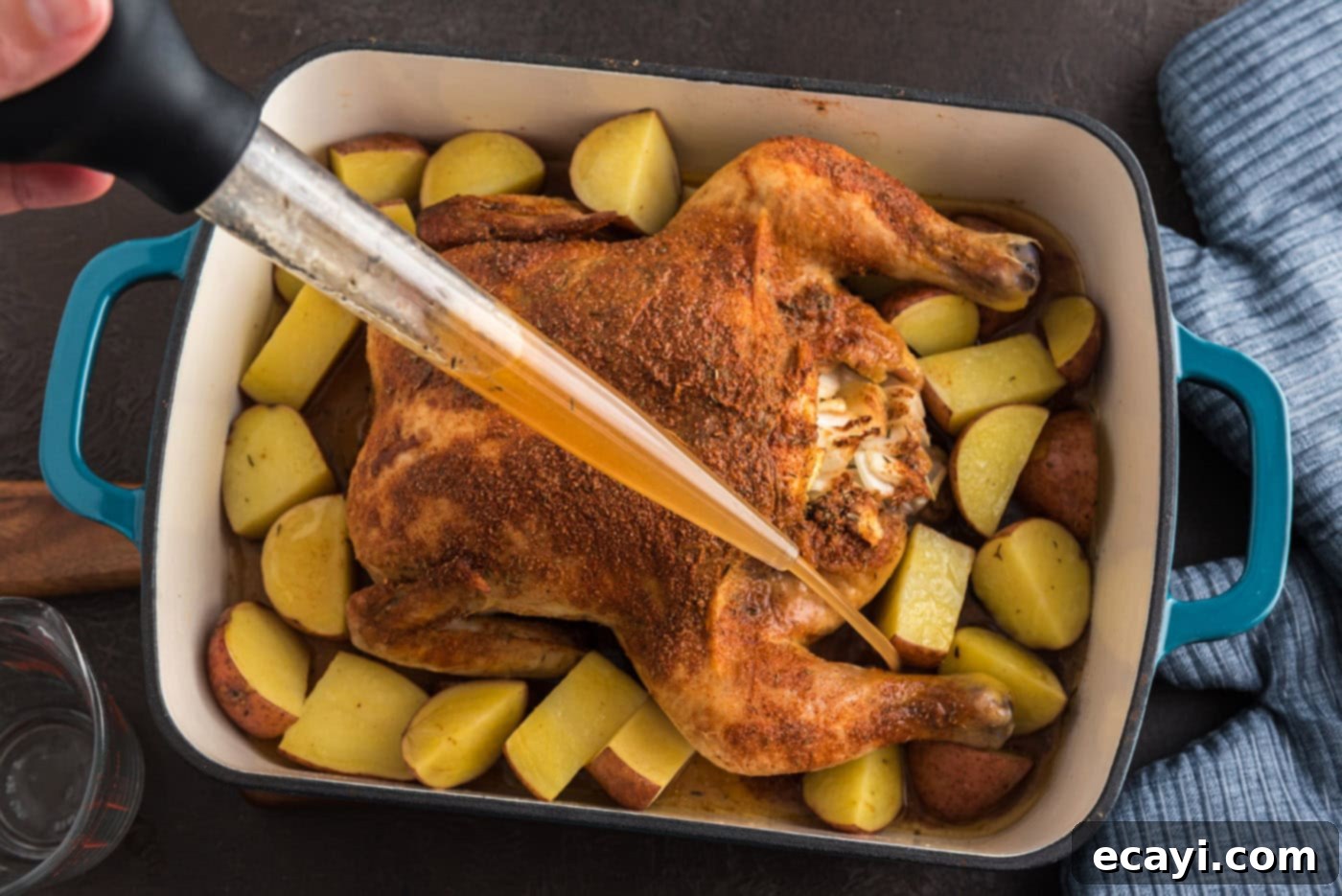 Slow Roasted Caramelized Chicken 9 basting chicken in a roasting pan