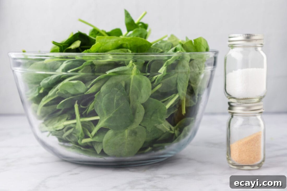 Perfectly Steamed Spinach 4 A bowl of fresh spinach leaves, ready for steaming