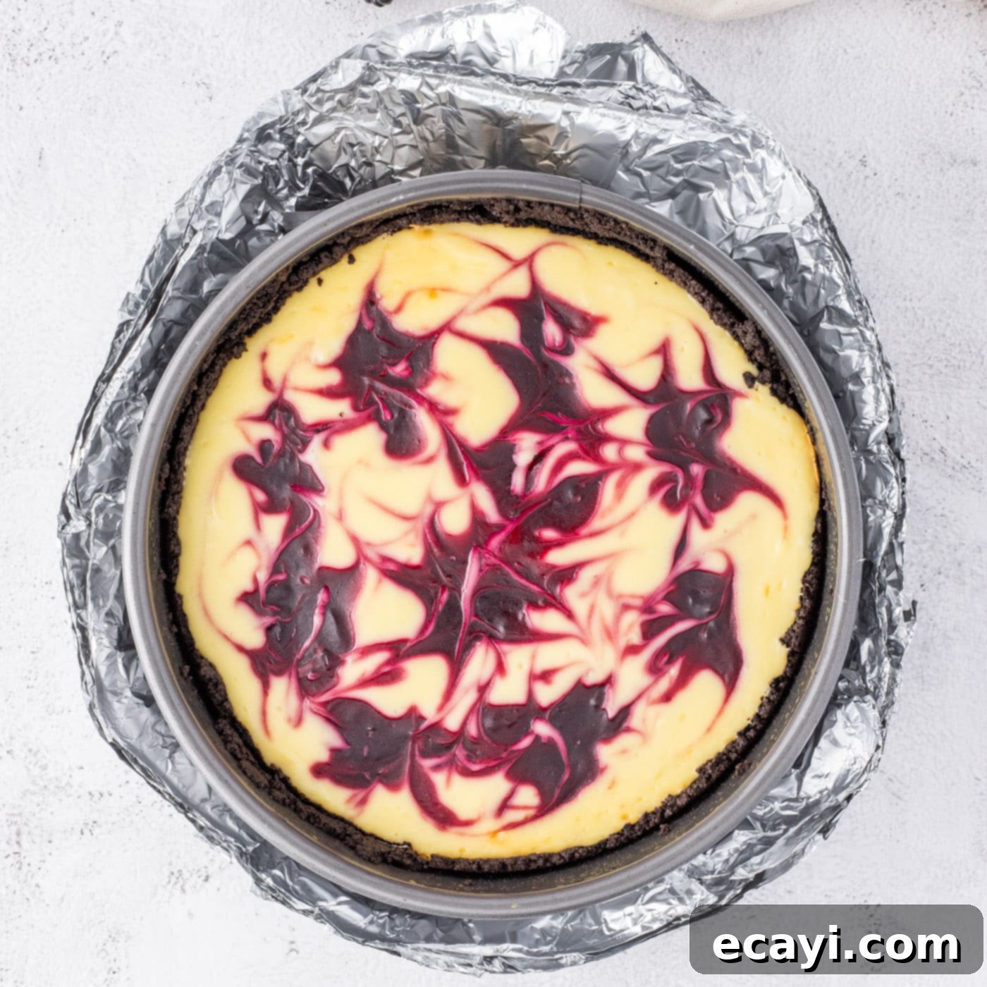 Blackberry Swirl Cheesecake 15 baked blackberry swirl cheesecake wrapped in aluminum foil