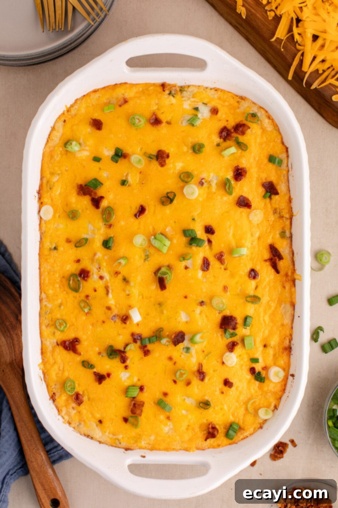 Loaded Cheesy Potato Casserole 3 Overhead photo of a golden brown Twice Baked Potato Casserole, freshly baked