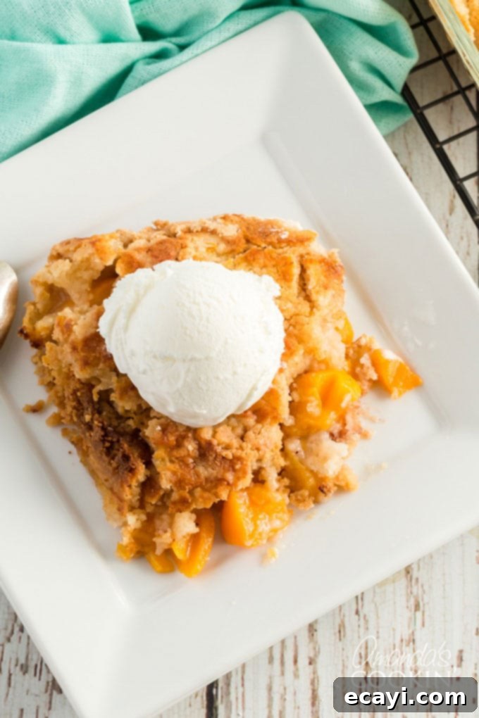 Effortless Peach Cobbler Bake 4 overhead view of peach dump cake with ice cream
