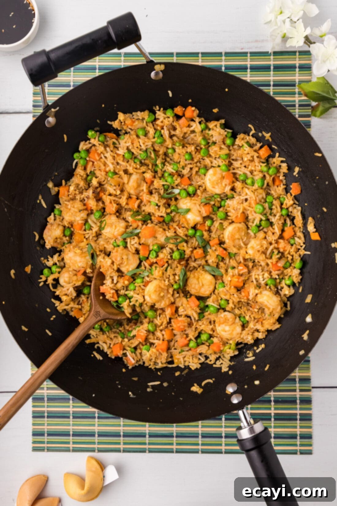 Golden Shrimp Fried Rice 2 Shrimp Fried Rice in a wok with a spoon