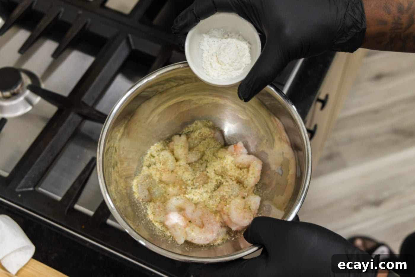 Golden Shrimp Fried Rice 5 adding cornstarch to bowl with seasoned shrimp